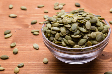 pumpkin seeds in a glass bowl