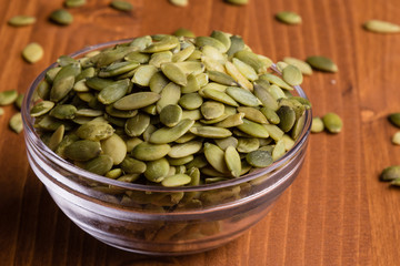 pumpkin seeds in a glass bowl
