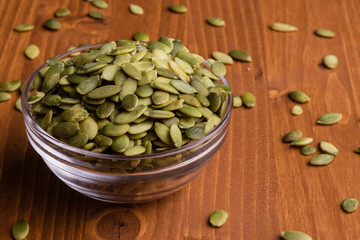 pumpkin seeds in a glass bowl