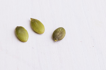 pumpkin seeds on white table