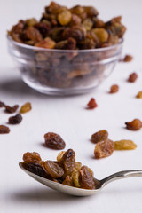 raisins on steel spoon