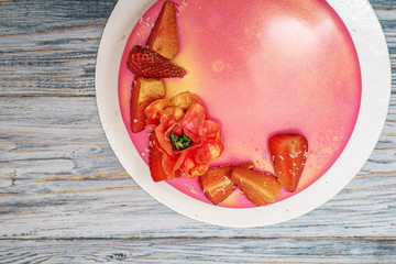 mousse cake decorated with strawberries