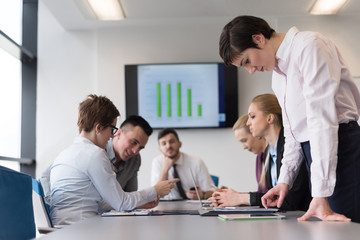 young  woman using  tablet on business meeting