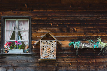 Bee hive on the wall of a village house, Grindelwald, Switzerlan