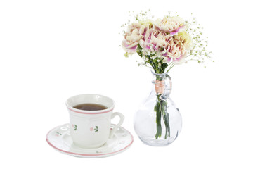 coffee and pink carnation on the vase