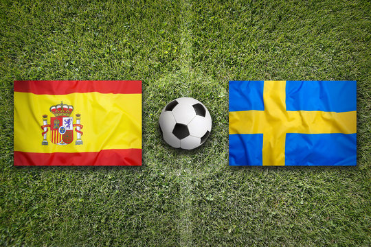 Spain vs. Sweden flags on soccer field