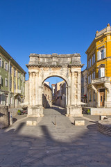 Fototapeta na wymiar Golden Roman Gate (Sergius Arch) in Pula, Croatia