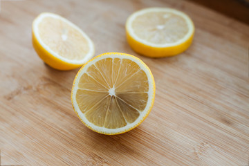 sliced lemon lies on a tree