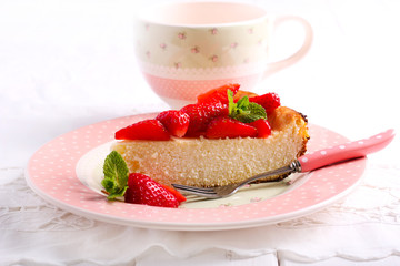 Cheesecake with strawberry topping,