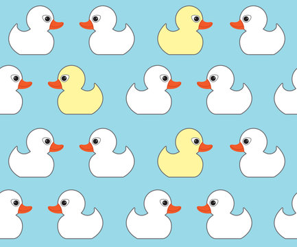 Seamless vector pattern with cute bright yellow ducks. Duck toy