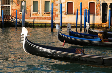Fototapeta na wymiar gondolas sailing the waters of the Grand Canal in Venice Italy