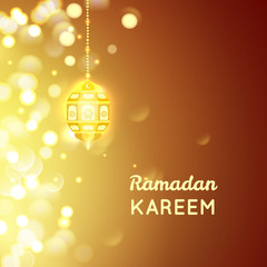 Beautiful Golden  lamp , Ramadan Kareem greeting on gold bokeh background