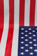 Obraz premium American flag falls gently on a table
