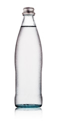 Glass bottle of water with drops