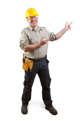 smiling worker with presenting gesture, clipping path included