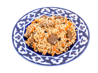 Fragrant pilaf with meat and dried apricots.