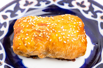 Traditional uzbek samsa bun with minced veal. 