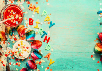 Happy birthday background with lettering, red decoration, cake and drinks , top view, place for...