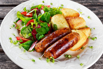 Roasted Sausages with Chips and Mix Vegetable salad