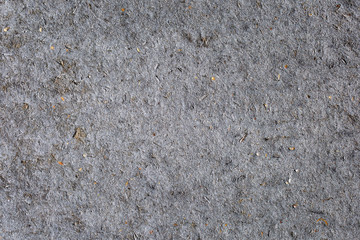 Old gray fiber with sawdust.Texture, background