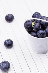 blueberries in small bucket