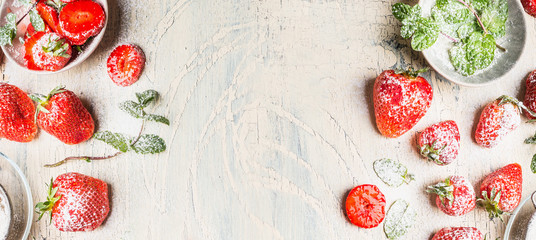 Sweet strawberries  with  powdered sugar  and mint leaves  on white shabby chic wooden background, top view, banner - Powered by Adobe
