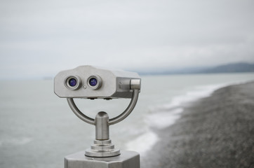 Binoculars with wonderful view, gray binoculars for viewing, sea