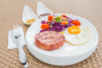 Salad and ham steak
