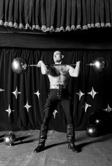 Portrait of one-eyed circus athlete. © Unique Vision