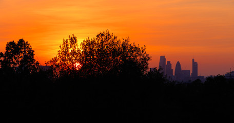 Sunset in London, forming a cityscape silhouette