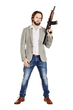 Man Holding A Machine Gun Isolated On White Background