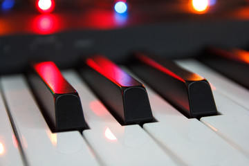 piano keyboard in a festive lighting