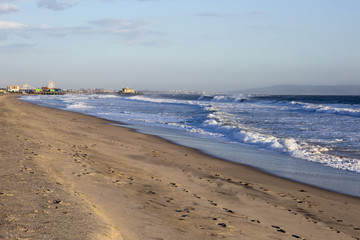 Amusement Park on the Pacific ocean, the beach landscape. The ocean, beach and blue sky in USA, Santa Monica. 
