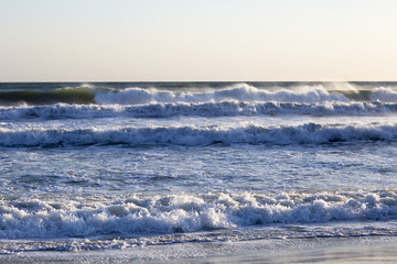The waves of the Pacific ocean, the beach landscape. The ocean and waves during strong winds in United States, Santa Monica.