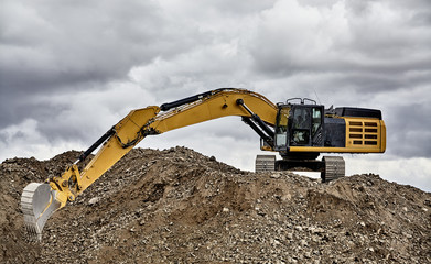 Constuction industry excavator heavy equipment full reach on job