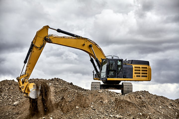 Constuction industry excavator heavy equipment on job site