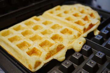 Making waffles on the waffle iron