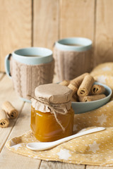 Apple jam, biscuits and coffee with milk for breakfast