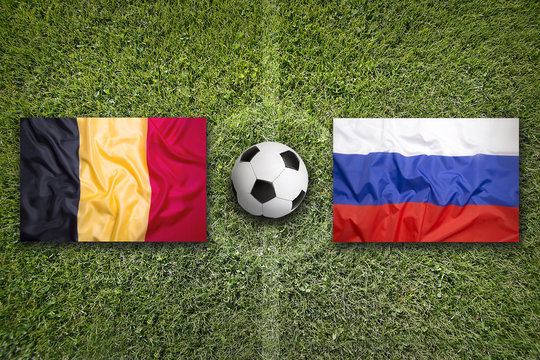 Belgium vs. Russia flags on soccer field