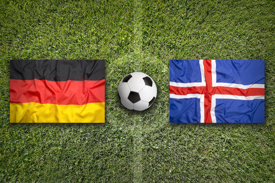 Germany vs. Iceland flags on soccer field