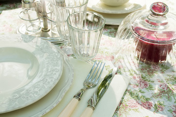 Empty classic white plate on the table with candle
