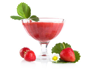 Fresh strawberries with goblet,leaves,flower on white