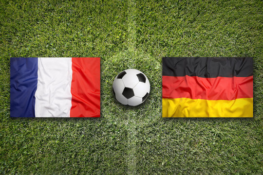 France vs. Germany flags on soccer field