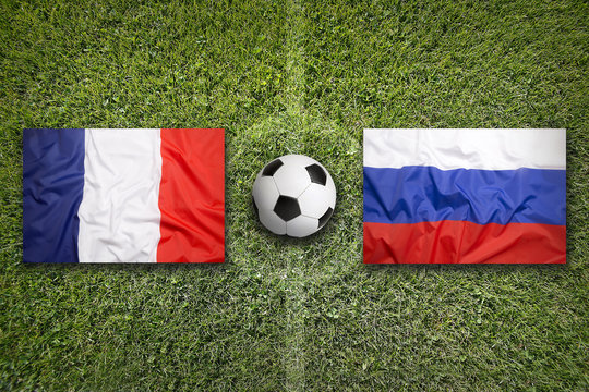 France vs. Russia flags on soccer field