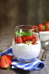 Chia seed pudding with strawberry and granola.