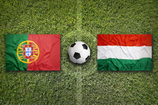 Portugal vs. Hungary flags on soccer field