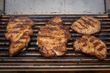 Pork steak on grill