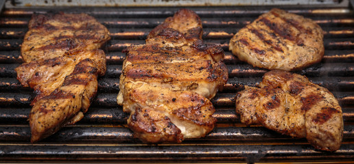 Pork steak on grill