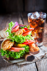 Closeup of delicious tortilla with chicken and vegetables