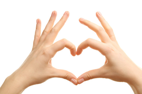 Female hands in heart shape on white background